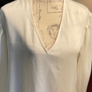 Joie Kynthia ivory long sleeve top with pearl button sleeve accents.